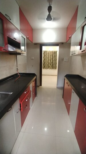 Kitchen in 1 BHK Apartment at Sudarshan Sky Garden, Ghodbunder Road – for Sale