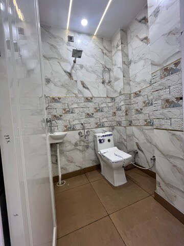 Bathroom in 3 BHK Apartment at Dwarka Mor – for Sale