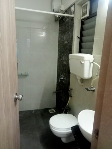 Bathroom in 1 BHK Apartment at Unique Estate, Mira Road – for Rent