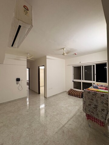 Living Room in 2 BHK Apartment at Lodha Amara, Kolshet Road – for Rent
