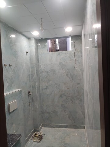 Bathroom in 4 BHK Apartment at Chittaranjan Park – for Sale