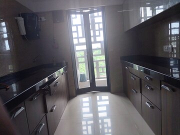 Kitchen in 1.5 BHK Apartment at Hubtown Hill Crest, Andheri East – for Rent