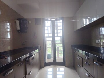 Kitchen in 1.5 BHK Apartment at Hubtown Hill Crest, Andheri East – for Rent
