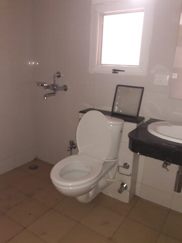 Bathroom in 4 BHK Apartment at AWHO Vijay Vihar, Wagholi – for Rent