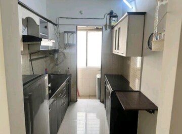Kitchen in 2 BHK Apartment at Bhoomi Acres, Waghbil – for Rent