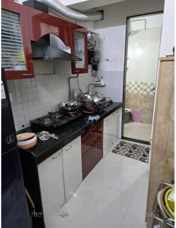 Kitchen in 2 BHK Apartment at Bhoomi Acres, Waghbil – for Rent
