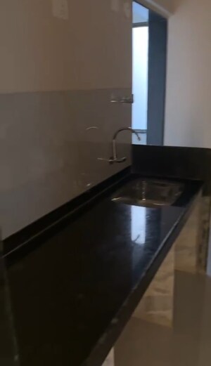 Kitchen in 2 BHK Apartment at Shiv Shakti Tower 28, Malad East – for Sale
