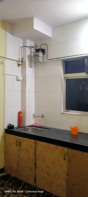 Kitchen in 2 BHK Apartment at Vimala Apartment, Malad West – for Sale