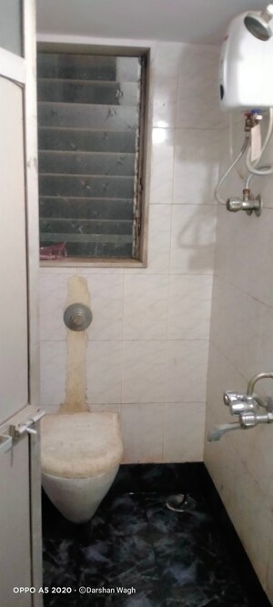 Bathroom in 2 BHK Apartment at Vimala Apartment, Malad West – for Sale
