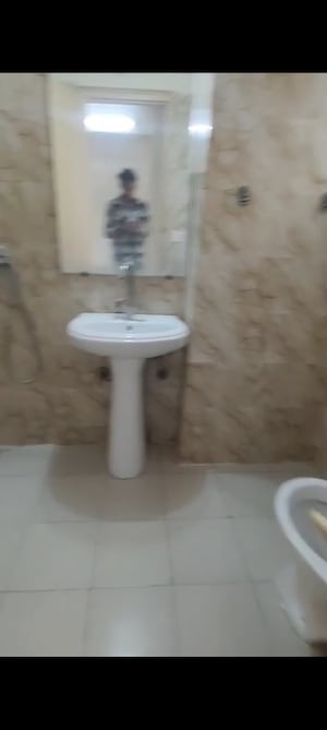 Bathroom in 3.5 BHK Apartment at Gaur City 4th Avenue, Sector 4 Greater Noida – for Rent