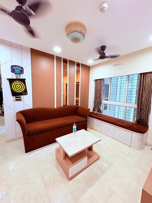 Living Room in 2 BHK Apartment at Lodha Amara, Kolshet Road – for Sale