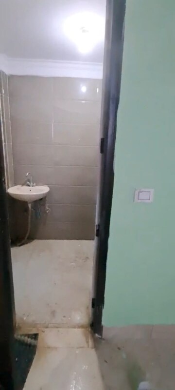 Bathroom in 3 BHK Builder Floor at Maan Heights, Gaur City 1 – for Rent