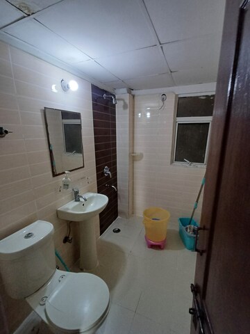 Bathroom in 3 BHK Apartment at Amrapali Zodiac, Sector 120 – for Sale