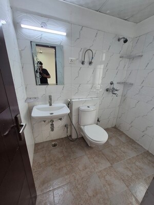 Bathroom in 2.5 BHK Apartment at Apex Athena, Sector 75 – for Sale