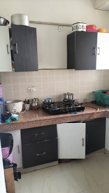 Kitchen in 2 BHK Apartment at SRS Royal Hills, Sector 87 – for Rent