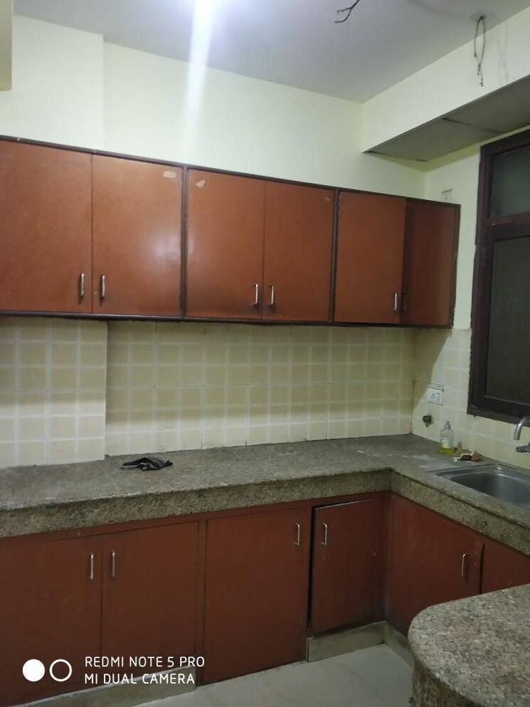 Kitchen, adore-happy-homes 2 Bedroom 478 Sq.Ft. Apartment In Sector 86 Faridabad 9125471