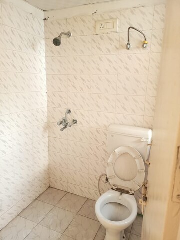 Bathroom in 2 BHK Apartment at Adore Happy Homes Grand, Sector 85 – for Rent