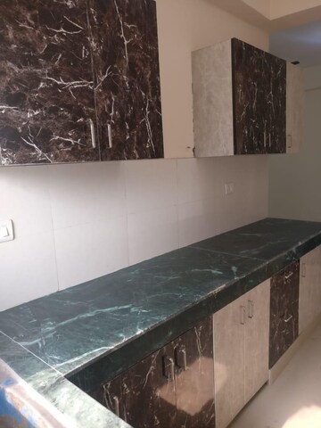 Kitchen in 2 BHK Apartment at Adore Happy Homes Grand, Sector 85 – for Rent