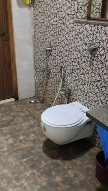 Bathroom in 3 BHK Apartment at Omkar Alta Monte, Malad East – for Rent