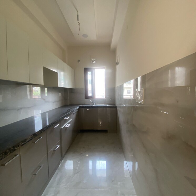 Kitchen, rps-palm-drive 2 Bedroom 125 Sq.Yd. Builder Floor In Khedi Road Faridabad 9125625
