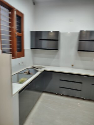 Kitchen in 3 BHK Builder Floor at Dhakoli – for Sale