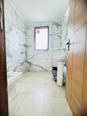 Bathroom in 3 BHK Builder Floor at Risland Sky Mansion, Chattarpur – for Rent