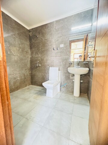 Bathroom in 3 BHK Builder Floor at Risland Sky Mansion, Chattarpur – for Rent