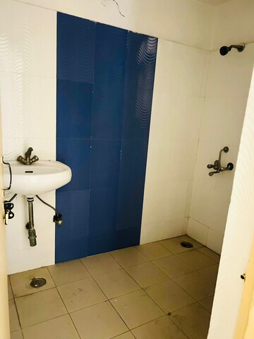 Bathroom in 2 BHK Apartment at Devika Skypers, Raj Nagar Extension – for Rent