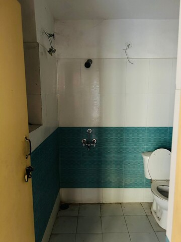 Bathroom in 2 BHK Apartment at Devika Skypers, Raj Nagar Extension – for Rent