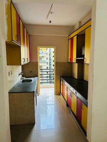 Kitchen in 2 BHK Apartment at Devika Skypers, Raj Nagar Extension – for Rent