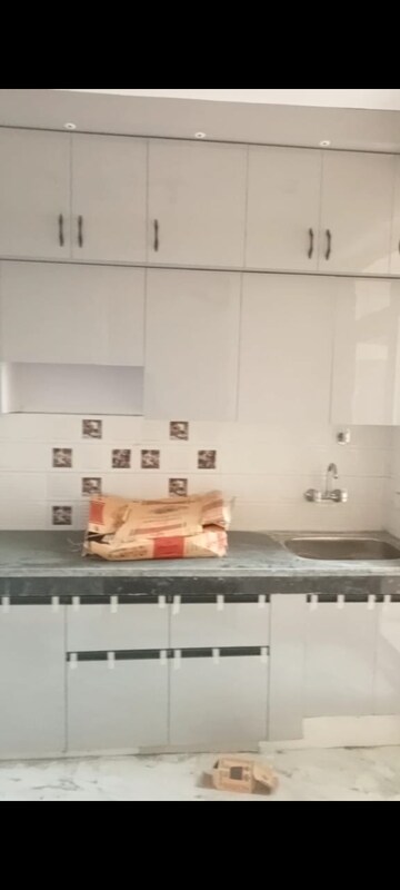 Kitchen in 2 BHK Apartment at Meenal Balmukund Residency, Raj Nagar Extension – for Sale