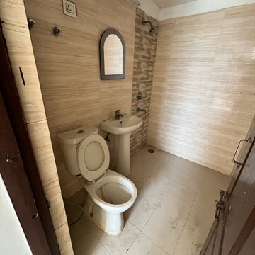 Bathroom in 2.5 BHK Apartment at Amrapali Zodiac, Sector 120 – for Rent