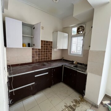 Kitchen in 2.5 BHK Apartment at Amrapali Zodiac, Sector 120 – for Rent