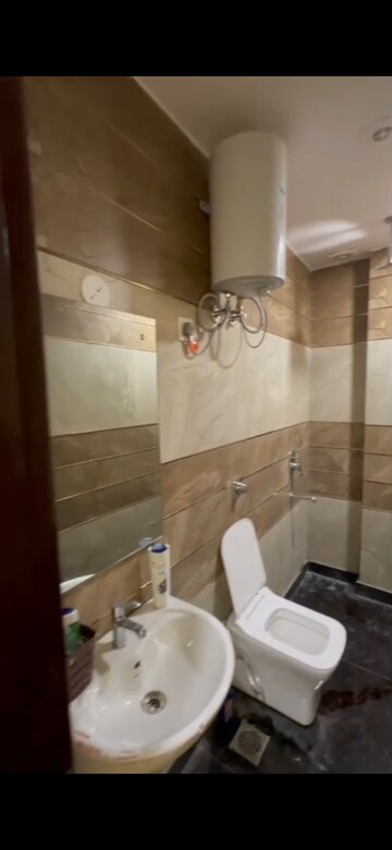 Bathroom in 1.5 BHK Builder Floor at Puri PP City Centre, Pitampura – for Rent