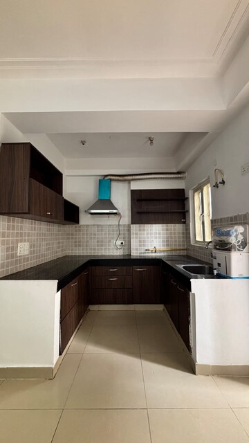 Kitchen in 2 BHK Apartment at Prateek Wisteria, Sector 77 – for Rent