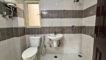 Bathroom in 2 BHK Apartment at Prateek Wisteria, Sector 77 – for Rent
