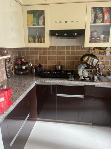 Kitchen in 2 BHK Apartment at Mahagun Mywoods, Sector 16c Greater Noida – for Rent