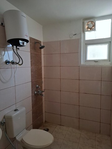 Bathroom in 3 BHK Apartment at Tulip Petals, Sector 89 – for Rent