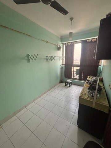 Kitchen in 4 BHK Apartment at Ramprastha Coral Heights, Ramprastha Greens – for Rent