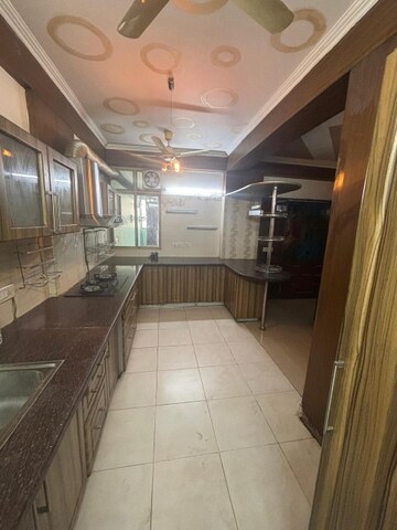 Kitchen in 4 BHK Apartment at Ramprastha Coral Heights, Ramprastha Greens – for Rent