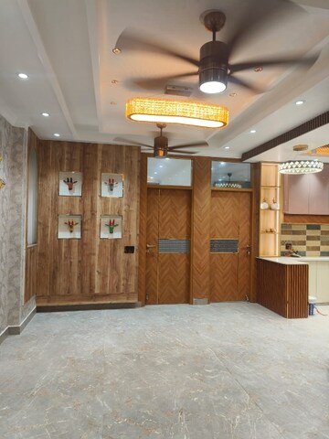 Living Room in 4 BHK Apartment at Ramprastha Coral Heights, Ramprastha Greens – for Rent