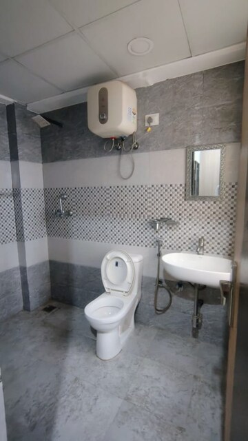 Bathroom in 3 BHK Builder Floor at Super Mart 1, Sector 27 – for Rent