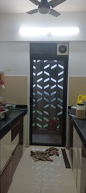 Kitchen in 1 BHK Apartment at Lodha Palava Downtown, Dombivli East – for Rent