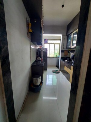 Kitchen in 2 BHK Apartment at Sadguru Heritage, Badlapur West – for Sale