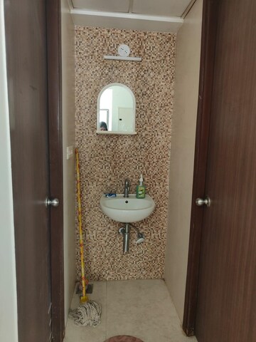 Bathroom in 1 BHK Apartment at Lodha Lakeshore Greens, Dombivli East – for Rent