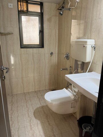 Bathroom in 2 BHK Apartment at Blue Mountains, Malad East – for Rent