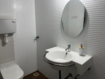 Bathroom in 2 BHK Apartment at Blue Mountains, Malad East – for Rent