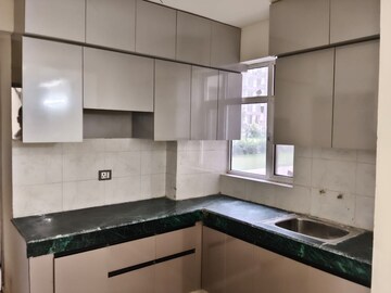 Kitchen in 2 BHK Apartment at Signature Global City, Sector 37d – for Rent