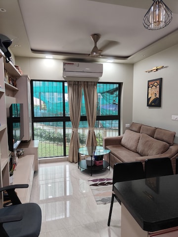 Living Room in 1 BHK Apartment at Lodha Crown Quality Homes, Majiwada – for Rent