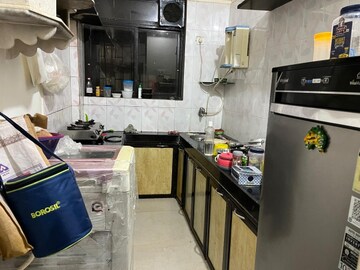 Kitchen in 2 BHK Apartment at Guru Mahima CHS, Sanpada – for Rent